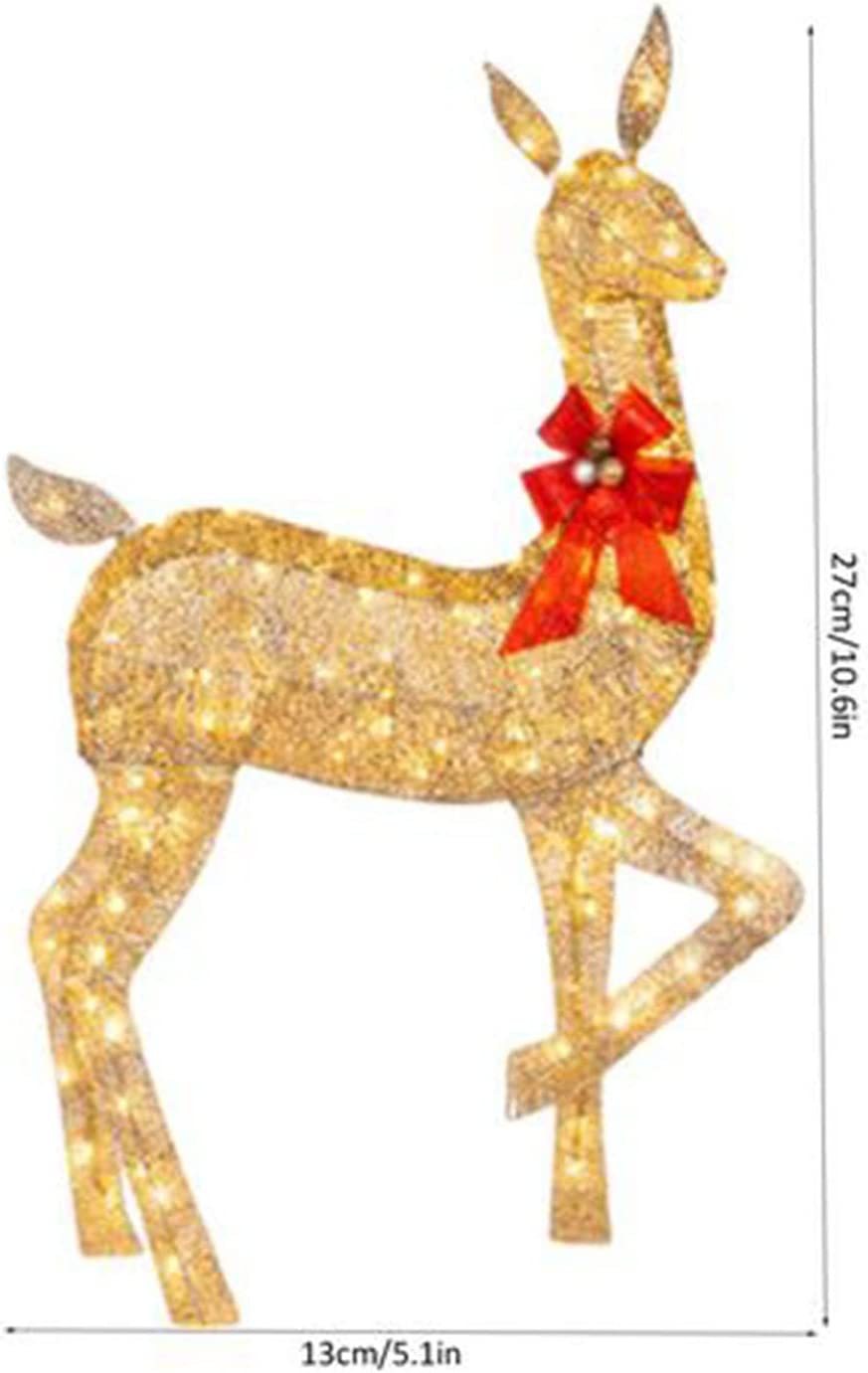 The Christmas Deer Lit In The Creative Yard, The Decorations With LED Lights Inserted In The Garden, The Lawn, The Courtyard